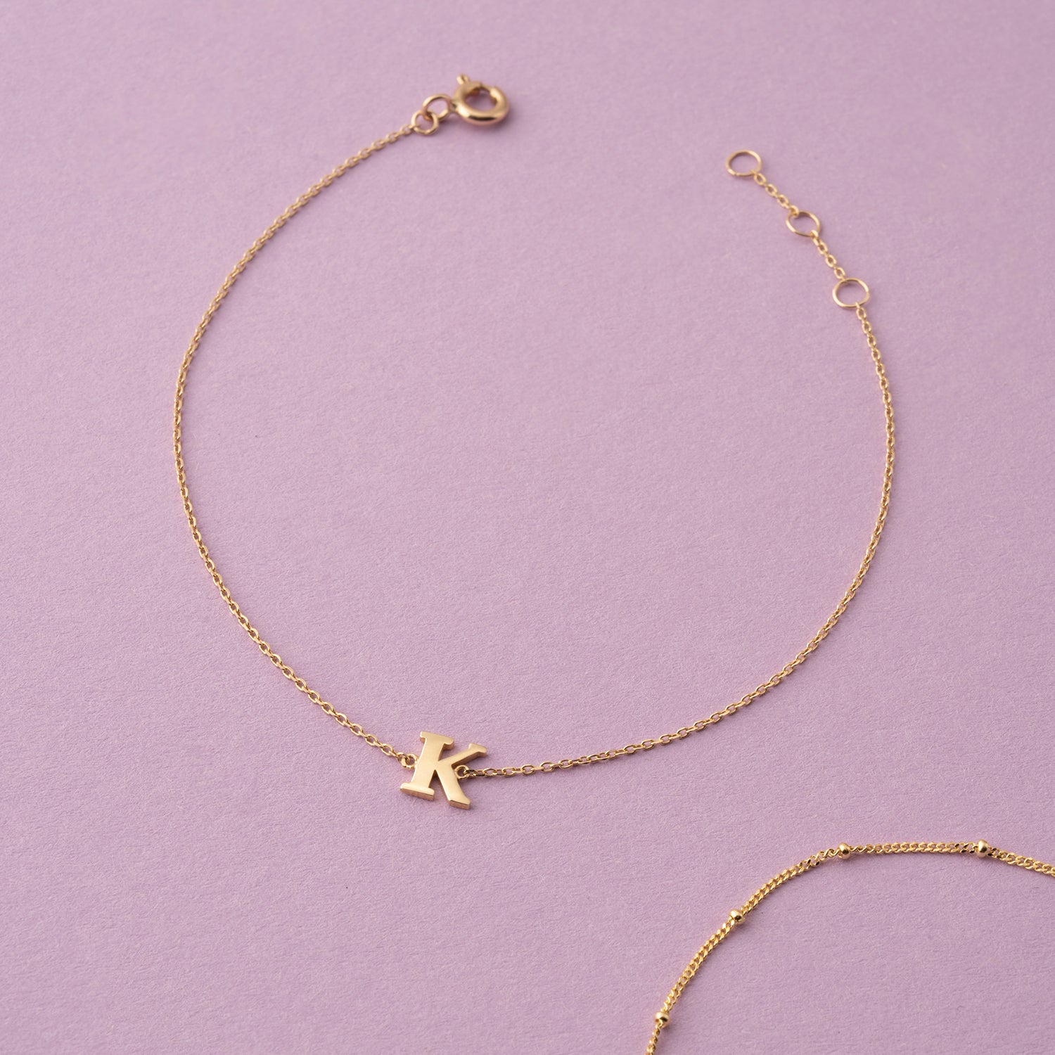 Armband Buchstabe 9K